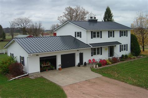 white house with charcoal metal roof|metal roof color schemes.